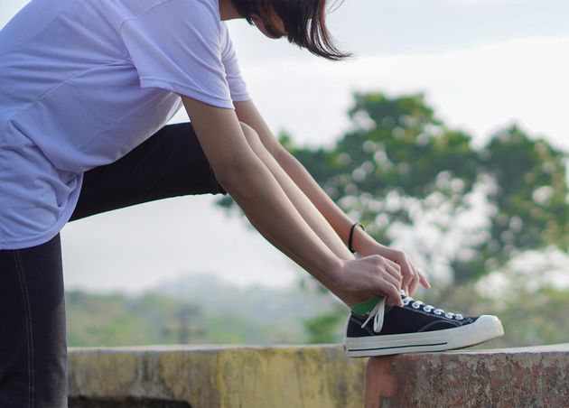 Young Asian Woman Has Prepare Her Shoes before Running Jogging Morning