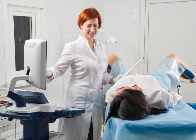 Gynecologist Holding Trans Vaginal Ultrasound Wand Exam Woman