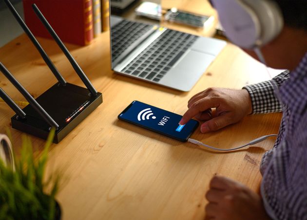 Young Man Connecting Router Wifi Smartphone Internet Social Media