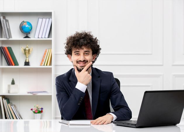 Customer Service Curly Brunette Young Man Office Suit Red Tie with Laptop Smiling Happily