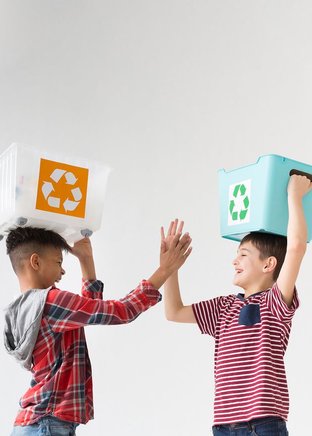 Adorable Young Boys Holding Recycle Boxes