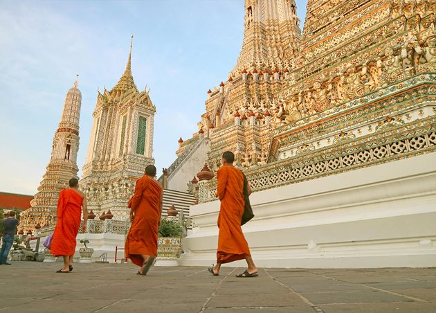 Wat Arun Temple Dawn with Group Buddhist Monks Foreground Bangkok Thailand