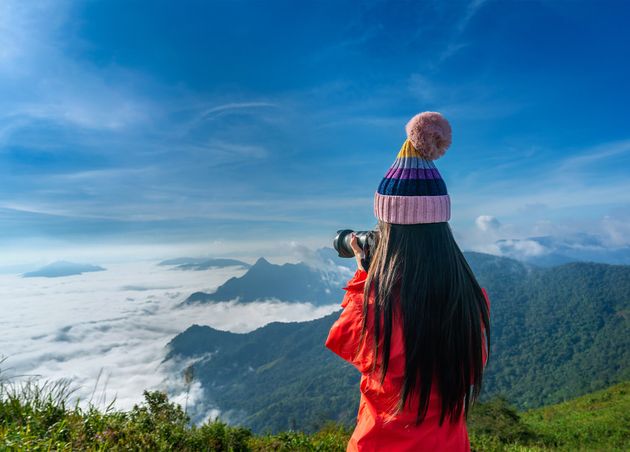 Tourist Taking Photographs with Digital Camera Mountains Phu Chi Fa Mountains Chiang Rai Thailand