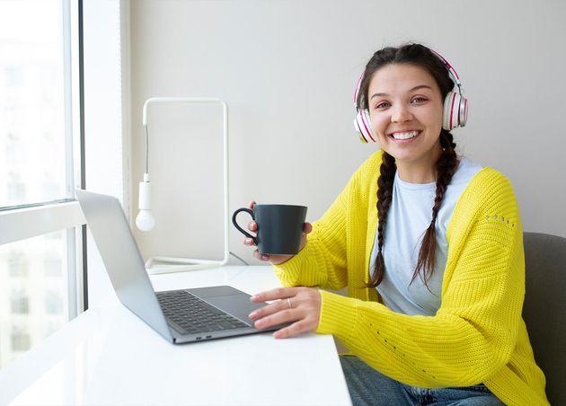 Young Woman Enjoying Listening Music