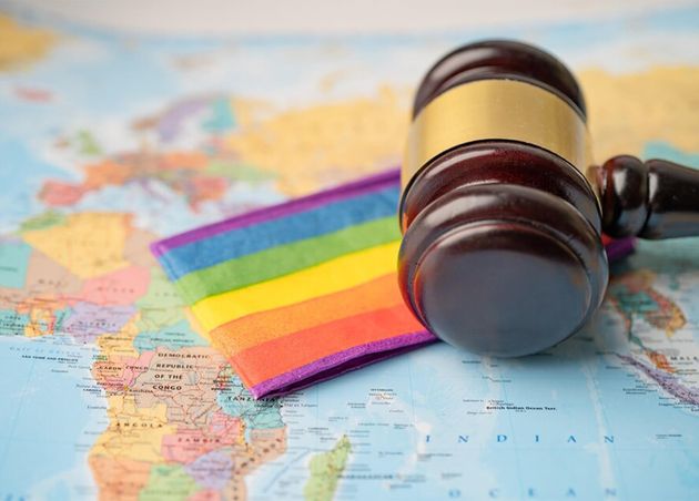 Bangkok Thailand December 1 2020 Lgbt Rainbow Flag with Gavel Judge Lawyer World Globe Map