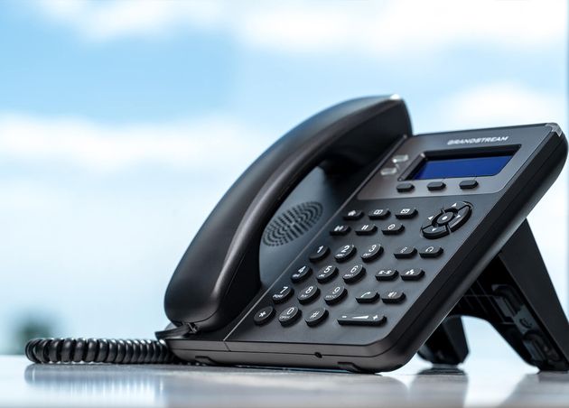 Telephone with Voip White Table by Window with Blurred Sky Background Customer Service Support Call Center Concept Telephone Devices Office Desk Modern Phone Voip