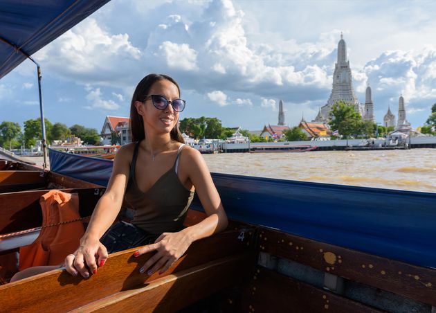 Tourist Woman Exploring City Bangkok with River Boat