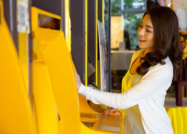 Young Asian Woman Withdrawing Money with Card Automatic Machine Female Standing Atm Bank