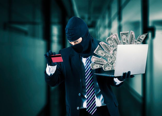 Hacker Wearing Business Suit Black Mask Holding Laptop Stealing Money