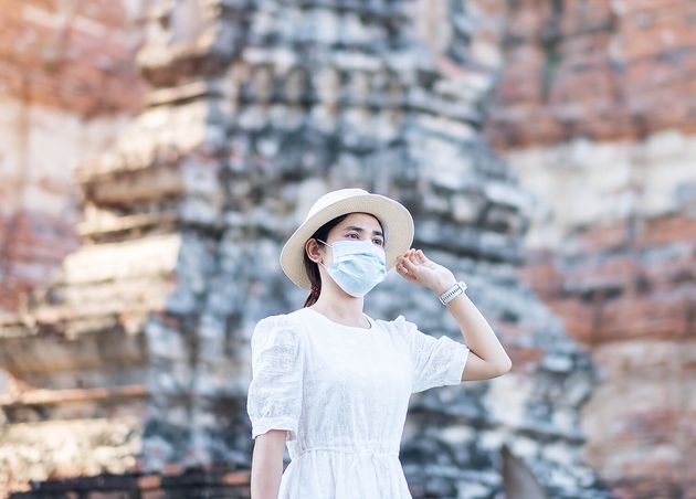 Female Tourist Wearing Surgical Mask Visiting Wat Chaiwatthanaram Temple