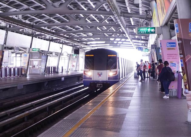 Bangkok Thailand Picture BTS Platform with Passengers Waiting Train Coming Stop Platform
