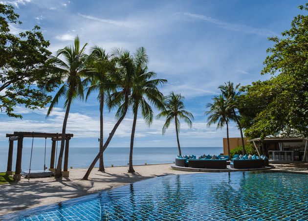 Hua Hin Thailand Tropical Pool with Palm Trees Luxury Resort Movenpick Huahin