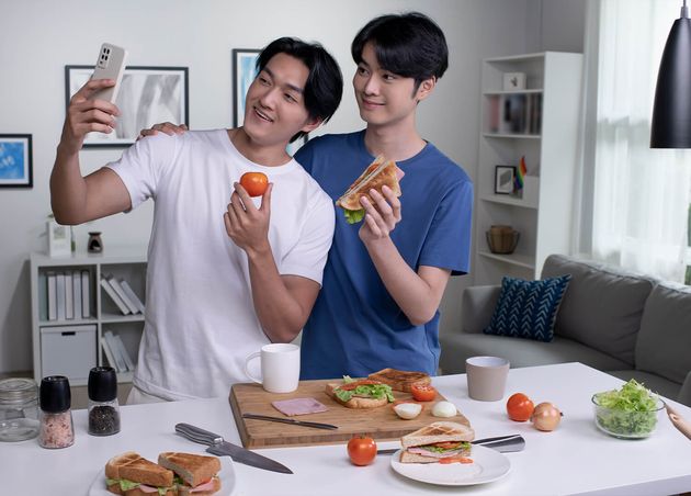 Young Asian Gay Couple Looking Happy while Cooking Taking Selfie Lgbt Men Couple Preparing Meal Salad Kitchen Home