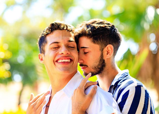Young Same Sex Couple Love Outdoors Together Showing All Feels