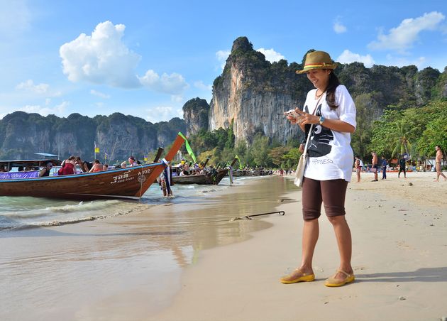 Krabi Thailand Thai Women Travelers People Travel Visit Rest Relax with Seascape Sea Ocean Andaman Walking Sand Beach Railay Island Ao Nang Bay