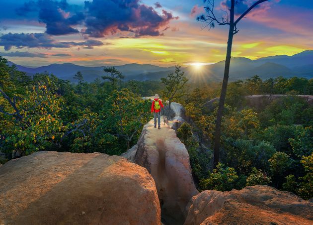 Young Man Trekking along Pai Canyon Mae Hong Son Province Thailand Adventure Trekking Trail Concept