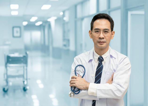 Portrait Asian Smart Doctor Standing with Space Text