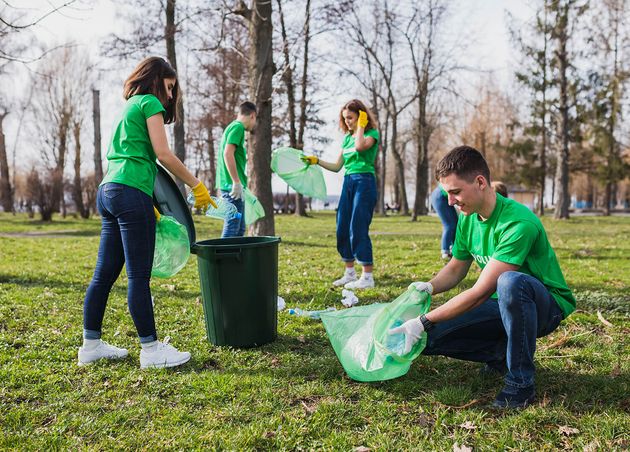 Group Volunteers Collecting Garbage
