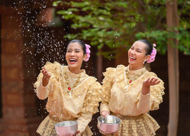 Young Smiling Women Dress Beautiful Thai Costumes Splashing Water Temples Preserve Good Culture Thai People during Songkran Festival Thai New Year Family Day April