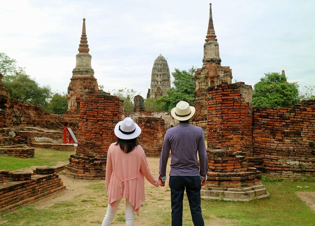 Couple Being Impressed by Awesome Temple Ruins Ayutthaya Historical Park Thailand