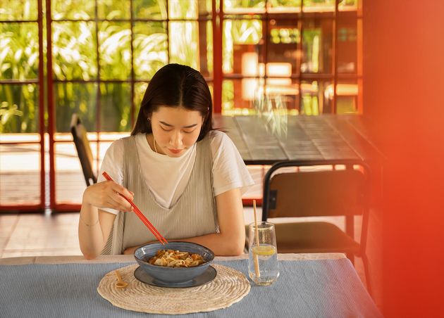 High Angle Woman Eating Tasty Noodles