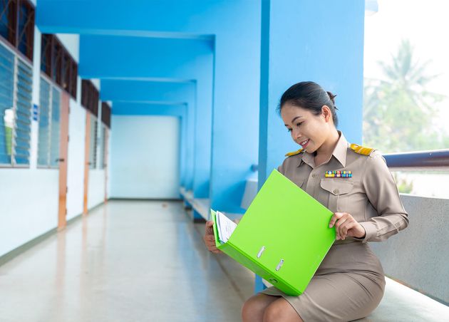 Thai Teacher Official Outfit Is Checking File Folder