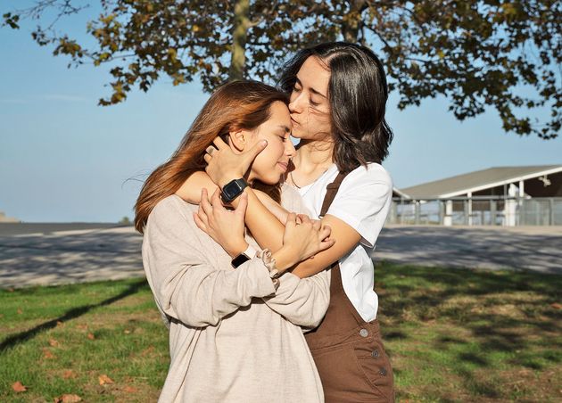 Young Woman Kissing Her Girlfriend
