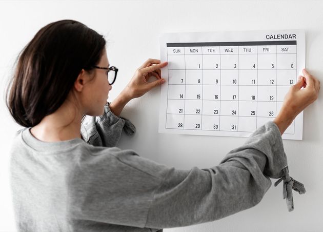 Woman Checking Calendar