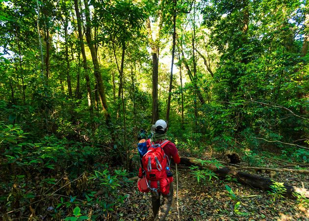 Male Tourist in Red Jacket Go Hiking Khao Laem National Park Kanchanaburi Thailand