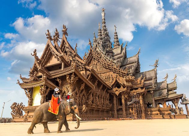 Tourists Ride Elephant around Sanctuary Truth Pattaya Thailand