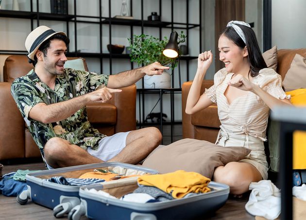 Happy Couple Asian Caucasian Marry Lover Wear Casual Cloth Enjoy Packing Cloth Travel Stuff Luggage Floor Living Room Lover Couple Singing Funny Dance Together Home
