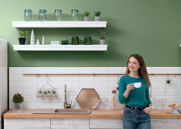 Woman Having Cup Coffee Green Kitchen