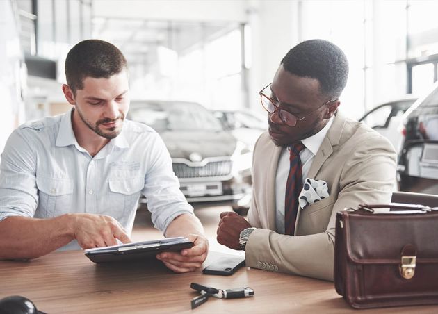 Young Attractive Black Businessman Buys New Car He Signs Contract Takes Keys Manager