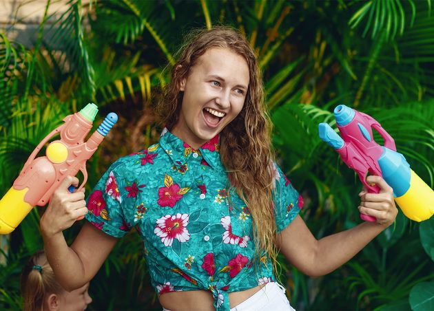 Caucasian Young Woman Are Ready Fight with Water Gun Songkran Festival Holiday Concept