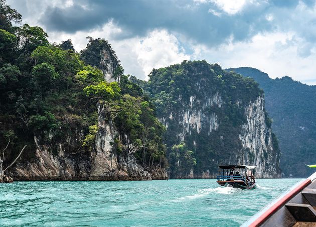 Amazed Nature Scenic Landscape with Boat Traveler Attraction Famous Landmark Tourist Travel Khao Sok National Park Thailand Long Tail Boat Trip