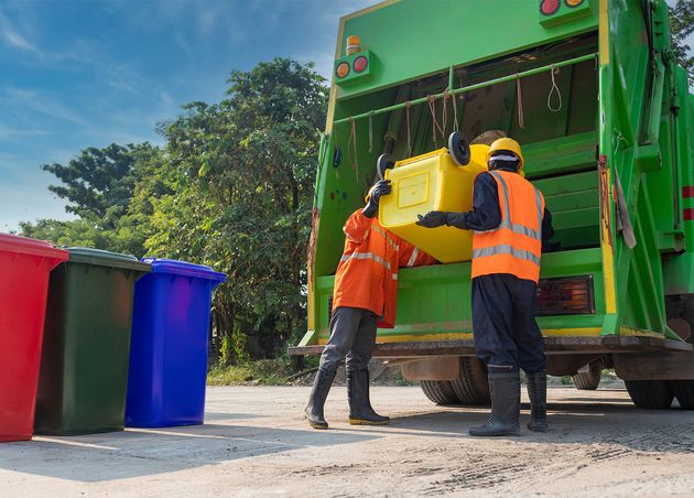 Teamwork Garbage Men Working Together Emptying Dustbins Trash Removal with Truck Loading Waste Trash Bin Garbage Collector