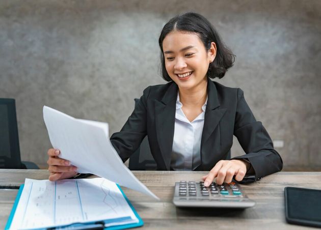 Woman Accountant Using Calculator Calculate Finance Report Office