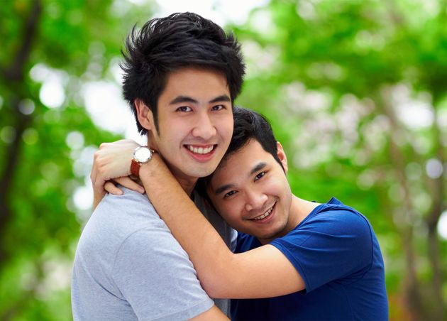Asian Men Gay Couple Hug by Trees Portrait Woods with Love Care Bonding Summer Sunshine Happy Japanese Man Romance Relax Together Forrest with Lgbtq Nature Holiday