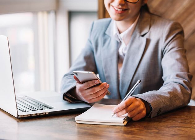 Businesswoman with Laptop Coffee Shop