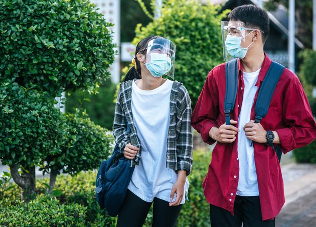 Male Female Students Wear Face Chill Masks Walk Footpath