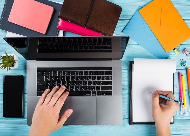 Colorful Office Supplies with Laptop