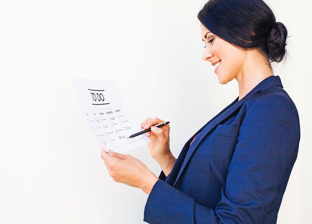 Woman Checking Tasks Completed Todo List