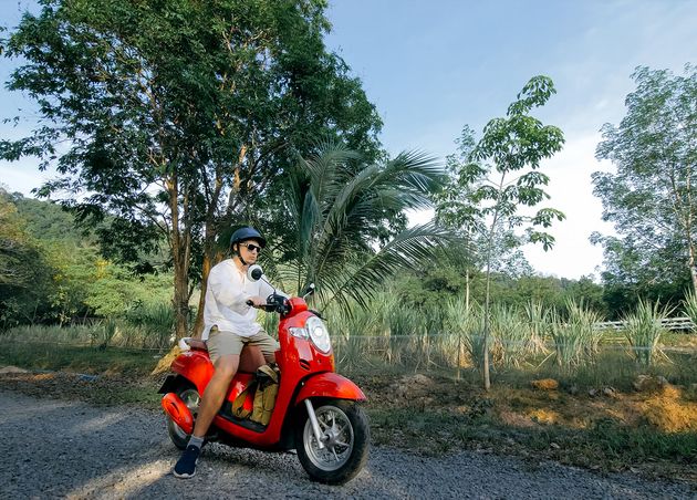 Man Red Motorbike White Clothes Drive Forest Road Trail Trip One Men Caucasian Tourist Go Scooter Nearby Tropical Palm Tree Asia Thailand Ride Tourism Motorcycle Rent Safety Helmet