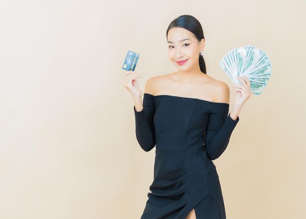 Portrait Beautiful Young Asian Woman Smile with Lot Cash Money Yellow