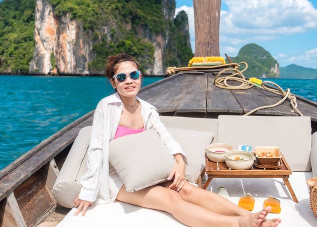 Woman Tourist Private Longtail Boat Trip Island with Exotic Food Picnic Krabi Thailand Landmark Destination Asia Travel Vacation Wanderlust Holiday Concept