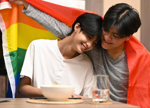Happy Young Homosexual Couple Embracing Lgbtq Pride Flag Concept Sexual Freedom Equal Rights Lgbt Community