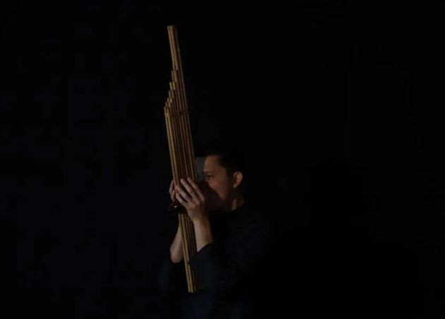 Man Playing Khaen A Traditional Thai Music Instrument