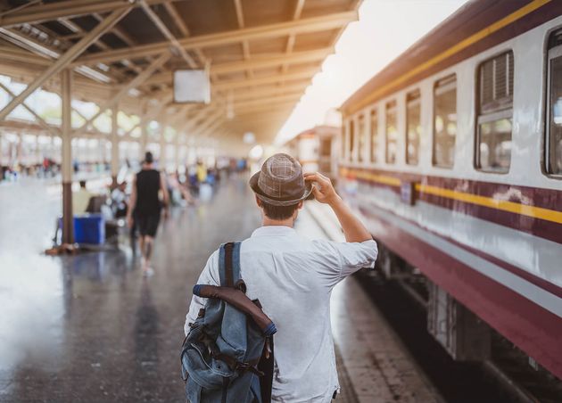 Asian Man Traveler with Backpack Waiting Train Asian Backpacker with Hat Standing Railway Platform Bangkok Train Station Holiday Journey Trip Summer Travel Concept